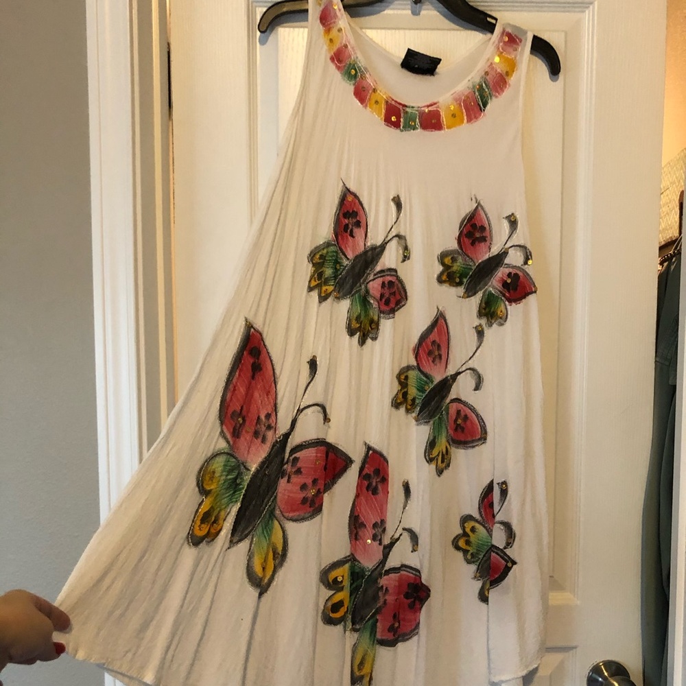 White sundress with sequin butterfly detail